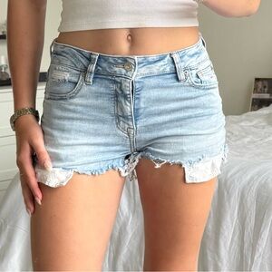 American Eagle next level stretch jean shorts with flower pockets